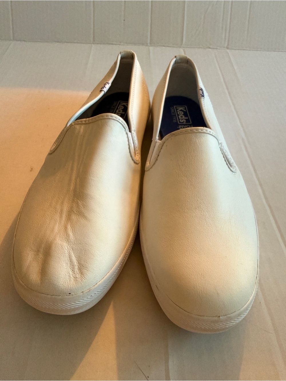 Keds Cream Slip-On Sneakers